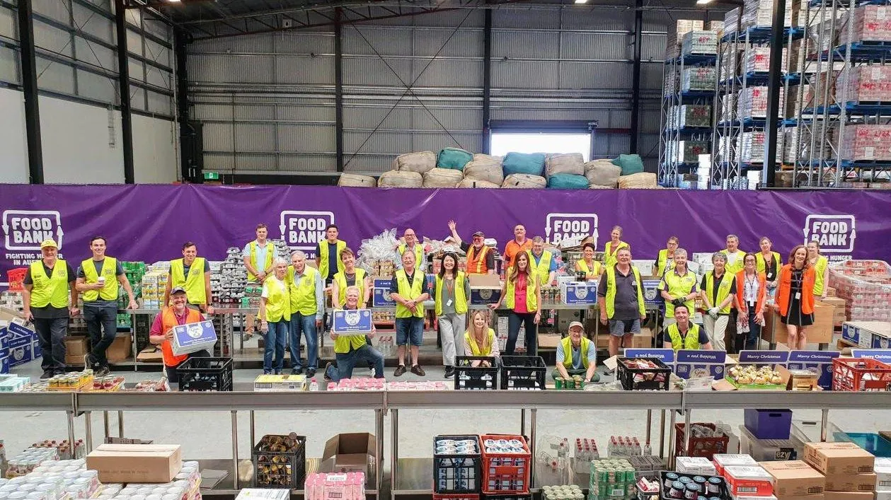 The Give A Feed packing team at Foodbank WA